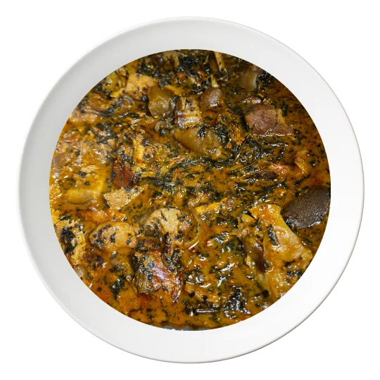 A plate of Bitter leaf soup (Ofe Onugbu), a traditional Igbo soup, order in Bolingbrook, Illinois