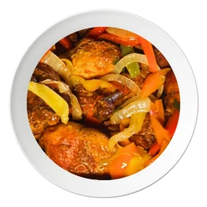 A plate of chicken drumsticks, seasoned Nigerian style, order in Bolingbrook, Illinois.