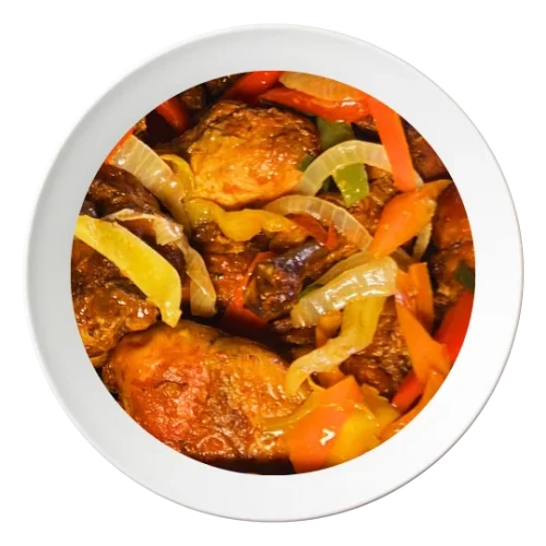 A plate of chicken drumsticks, seasoned Nigerian style, order in Bolingbrook, Illinois.