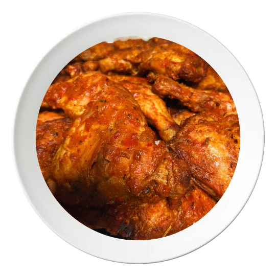 A plate of chicken lap, seasoned and cooked Nigerian style, available in Bolingbrook, Illinois.