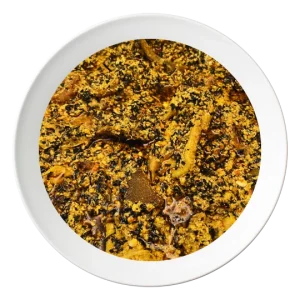 A plate of Egusi soup, a Nigerian melon seed soup with assorted meats, available for delivery in Bolingbrook, Illinois