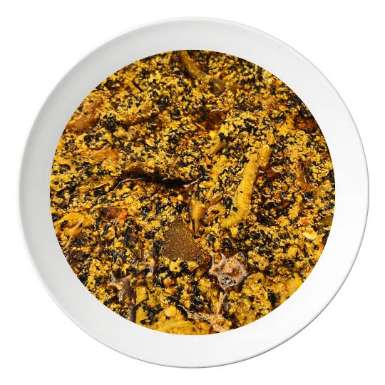A plate of Egusi soup, a Nigerian melon seed soup with assorted meats, available for delivery in Bolingbrook, Illinois