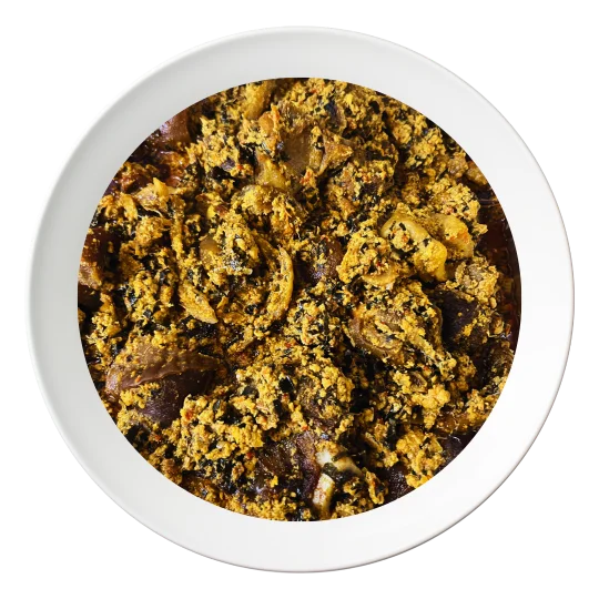 A plate of Egusi soup with spinach, vegetables, and oziza leaf, a flavorful Nigerian dish, order in Bolingbrook, Illinois