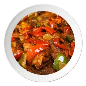 A plate of Hake whitening fish, cooked with Nigerian spices, order in Bolingbrook, Illinois.