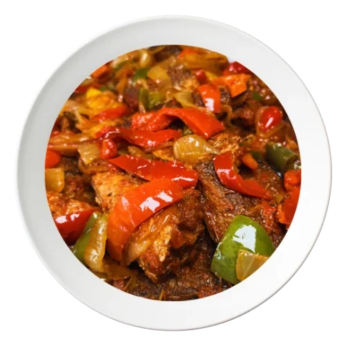 A plate of Hake whitening fish, cooked with Nigerian spices, order in Bolingbrook, Illinois.