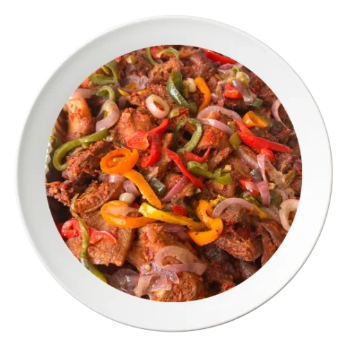 A plate of mixed meats, cooked in Nigerian style, order in Bolingbrook, Illinois.
