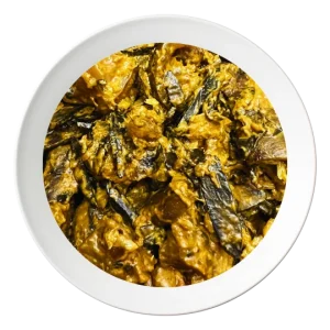 A plate of Nkwobi, a spicy Nigerian cow leg appetizer, order in Bolingbrook, Illinois.