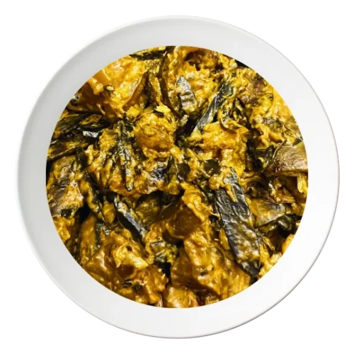 A plate of Nkwobi, a spicy Nigerian cow leg appetizer, order in Bolingbrook, Illinois.
