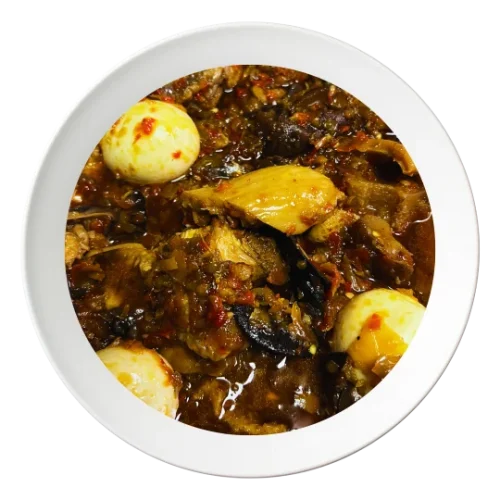 A plate of Ofada Ayamase stew, a Nigerian designer stew, served in Bolingbrook, Illinois