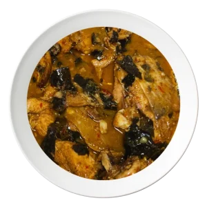 A serving of Ofe Nsala soup, a spicy Nigerian white pepper soup with catfish, available in Bolingbrook, Illinois.