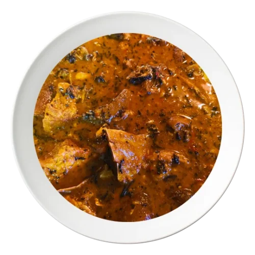 A serving of Ogbono soup, a Nigerian draw soup with assorted meats, available for order in Bolingbrook, Illinois