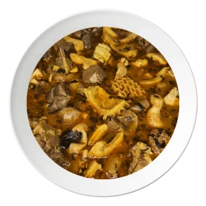 A bowl of Nigerian pepper soup, with goat meat, a spicy Nigerian soup, served in Bolingbrook, Illinois.