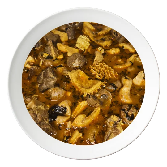 A bowl of Nigerian pepper soup, with goat meat, a spicy Nigerian soup, served in Bolingbrook, Illinois.