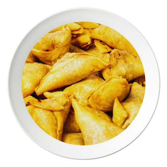 A plate of Samosas, Nigerian-style pastries filled with spiced meat, available in Bolingbrook, Illinois.