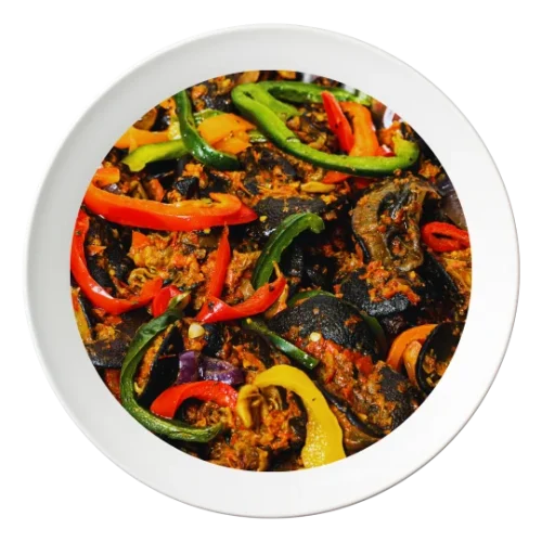 A plate of sautéed big size snail, with peppers and onions, order in Bolingbrook, Illinois.